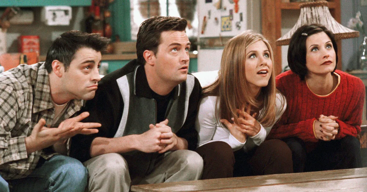 The Friends cast waiting hopefully, like users wondering if the new savings feature actually worked
